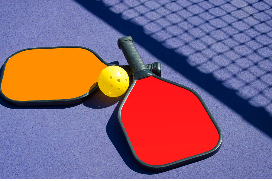 Pickleball racquets with pickleball grip tape to play pickleball games