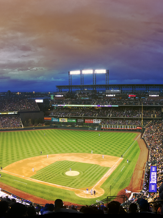 Baseball stadium at night where baseball traditions are created and celebrated by baseball fans