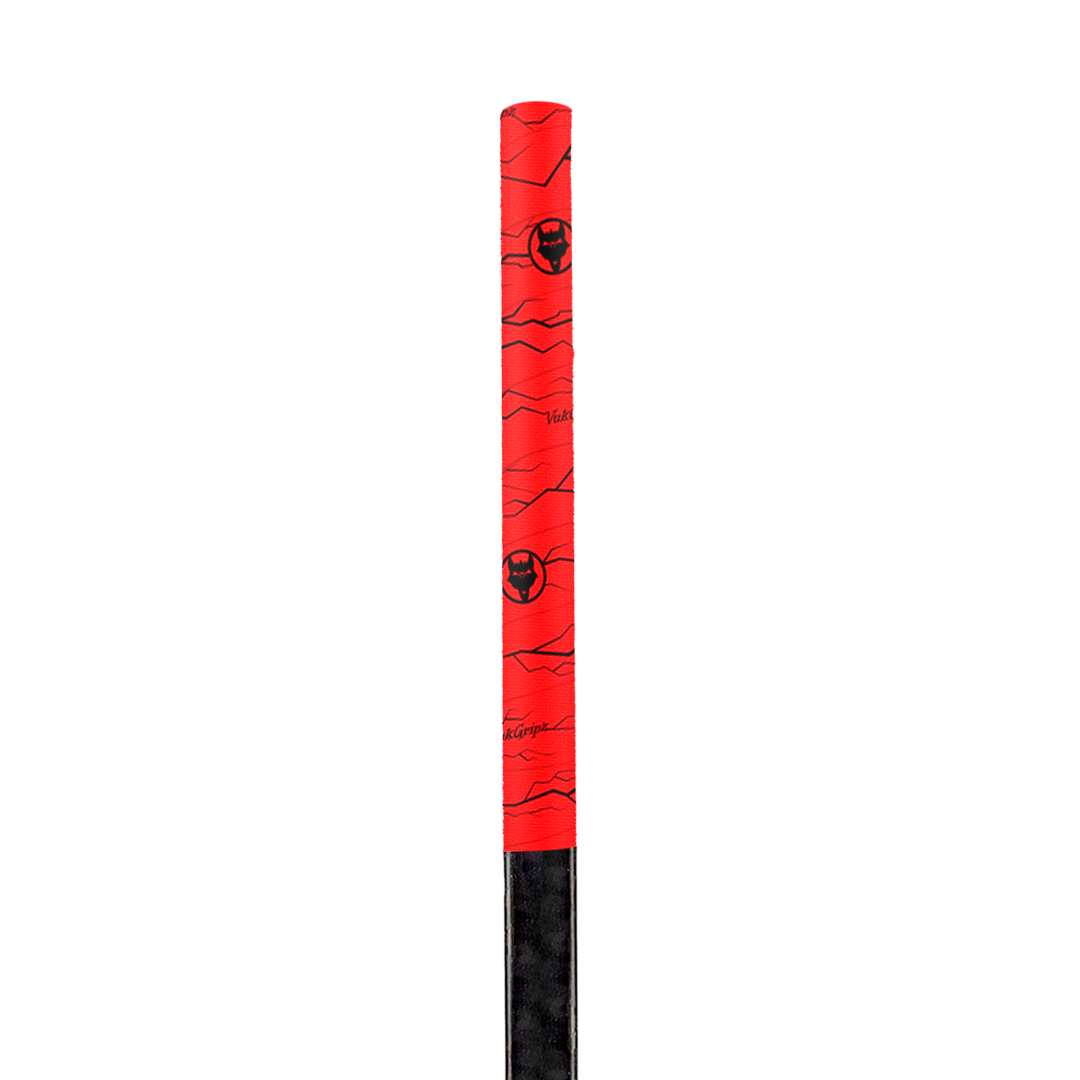A roll of high-quality Pulse Red hockey grip tape, designed for superior grip and durability, displayed on a clean hockey stick. The hockey stick grip tape features an unmatched texture, ideal for securing your hands for improved puck control, with premium materials made in the USA.
