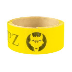 Yellow golf grip tape with black